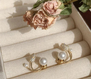 FLOWER DESIGN GOLD PLATED PEARL STUDS